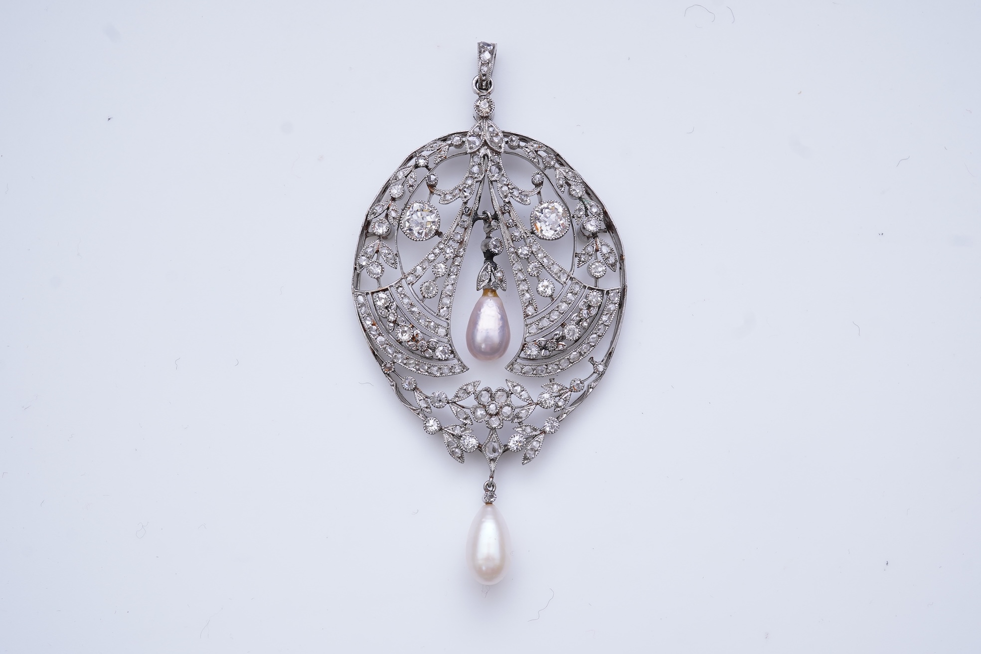 A fine Belle Epoque natural pearl and diamond pendant, circa 1910